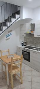 Kuchyň nebo kuchyňský kout v ubytování Stop al Duomo