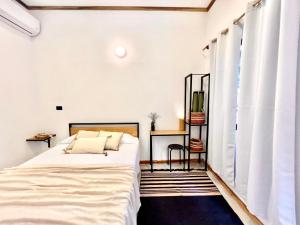 Voodi või voodid majutusasutuse Calipso Ocean Lodge- Avellana Beach Hotel toas