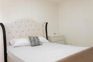 Postel nebo postele na pokoji v ubytování Apartamento en Pueblo Bavaro