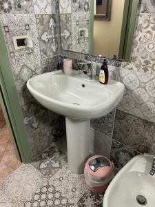 a bathroom with a sink and a toilet at Maison Lume in Ponte di Legno +11 photos