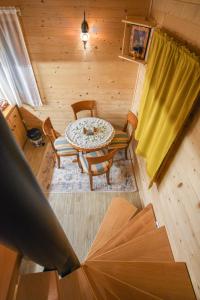 an overhead view of a room with a table and chairs at Koliba Vuk in Sekulić 