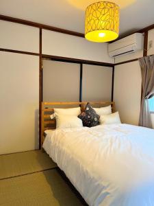 A bed or beds in a room at Nobana Mikkabi - Vacation STAY 14751