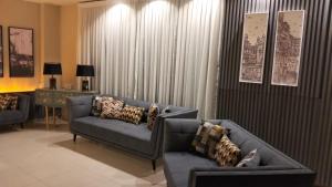 Posezení v ubytování Shelton Boulevard Hotel Lahore
