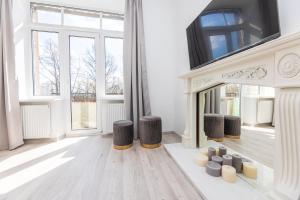 Televisor o centre d'entreteniment de Heritage House Dane apartment