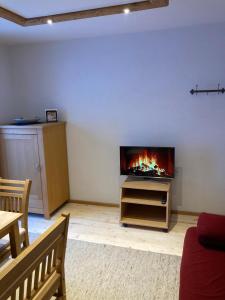 TV a/nebo společenská místnost v ubytování Ferienwohnung Susanne