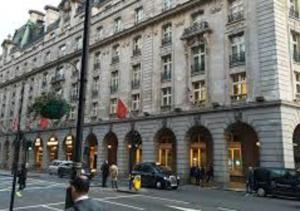 a large building on a street in front of a building at Mayfair Town House in London