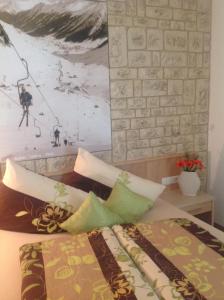 Postel nebo postele na pokoji v ubytování fabienne - Silvretta Premium Card Betrieb