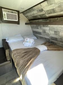Postel nebo postele na pokoji v ubytování Paseo Isamar Campers