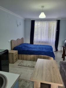 Postel nebo postele na pokoji v ubytování Guest House Sando