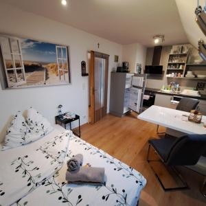 a living room with a couch and a table at Apartment Schloffer in Weiz