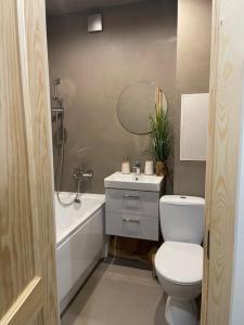 Koupelna v ubytování Cozy Corner in Ogre