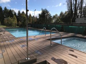 Πισίνα στο ή κοντά στο Casa ITALIA Condominio Parque Pinares