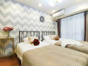 Katil atau katil-katil dalam bilik di S15新宿最中心 東新宿站5分-Shinjuku center 5 mins to Station, Max 3P 新宿 涉谷 表参道 池袋 上野 代代木 银座 原宿