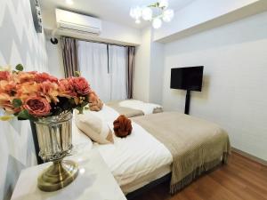 Katil atau katil-katil dalam bilik di S15新宿最中心 東新宿站5分-Shinjuku center 5 mins to Station, Max 3P 新宿 涉谷 表参道 池袋 上野 代代木 银座 原宿