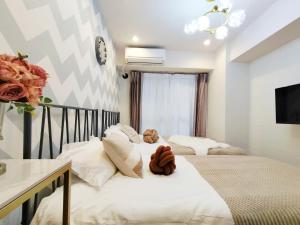 Katil atau katil-katil dalam bilik di S15新宿最中心 東新宿站5分-Shinjuku center 5 mins to Station, Max 3P 新宿 涉谷 表参道 池袋 上野 代代木 银座 原宿