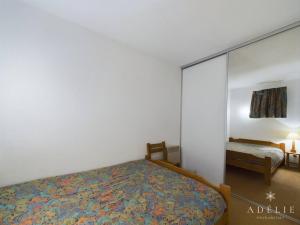 Appartement Montvalezan-La Rosière, 2 pièces, 4 personnes - FR-1-398-522にあるベッド