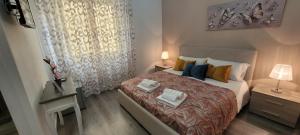 Postel nebo postele na pokoji v ubytování B&B A Modo Mio