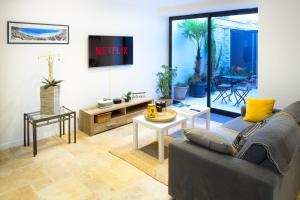 O zonă de relaxare la Magnifique appartement au centre-ville de Nice
