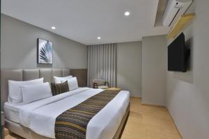 Katil atau katil-katil dalam bilik di Hotel Shivashish