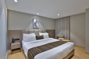 Katil atau katil-katil dalam bilik di Hotel Shivashish