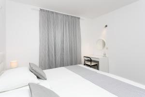 Posteľ alebo postele v izbe v ubytovaní Apartment Dupčić