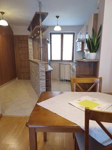 Posedenie v ubytovaní Apartament pod Nosalem