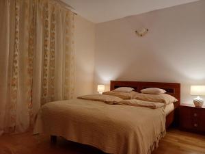 Posteľ alebo postele v izbe v ubytovaní Apartament pod Nosalem