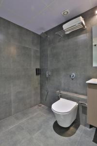 Koupelna v ubytování Hotel Shivashish
