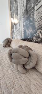 a large circular object sitting on the floor in a room at Hotel Everest Arco in Arco