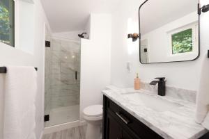 a bathroom with a sink and a shower at 4459 County Rd 203 - (2) in Durango