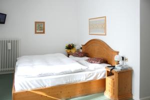 Łóżko lub łóżka w pokoju w obiekcie Hotel Oasi