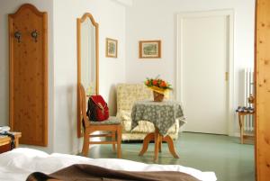 Łóżko lub łóżka w pokoju w obiekcie Hotel Oasi