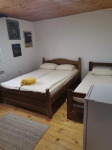 Postel nebo postele na pokoji v ubytování Gazdinstvo Vujičić