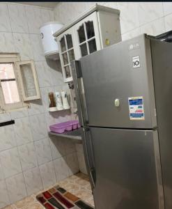 Koupelna v ubytování Almansoura Nour Apartment