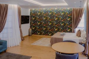 Łóżko lub łóżka w pokoju w obiekcie Miramar Boutique Apartments ADULTS ONLY CORRALEJO