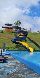 a water slide at a water park at ECO CHALÉ PARK CACHOEIRAS in Presidente Figueiredo