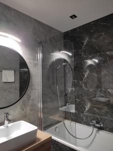 Kúpeľňa v ubytovaní Apartament Zamkowe Wzgórze