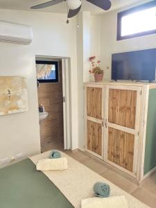 Postel nebo postele na pokoji v ubytování Sfeervolle studio in Encuentro Cabarete