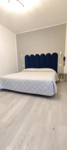 Voodi või voodid majutusasutuse Hotel Everest Arco toas
