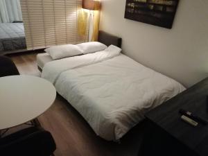 Central suite on Clock Square D1客房内的一张或多张床位