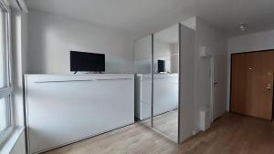 Kuchyňa alebo kuchynka v ubytovaní Życzliwy Apartament z garażem