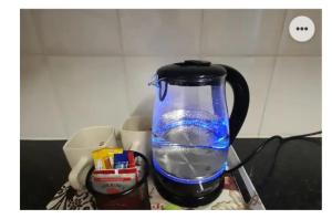 a jug filled with water on top of a counter at Kennaway Court in East London +32 photos