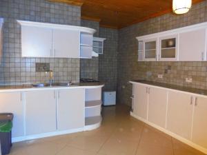 Kuchyň nebo kuchyňský kout v ubytování Iris Guest House