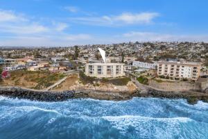 an aerial view of a city and the ocean at Sunset Cliffs Lookout - Ocean Front Luxury Condo in San Diego