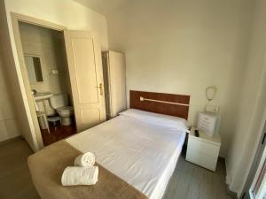 Postel nebo postele na pokoji v ubytování LÀtic Rooms