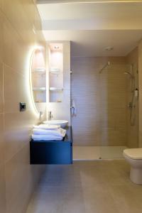 Koupelna v ubytování La Pergola Suites