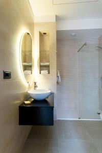 Koupelna v ubytování La Pergola Suites