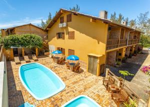 Afbeelding uit fotogalerij van Pousada do Paraiso in Barra de Ibiraquera