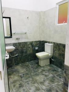 Koupelna v ubytování Green jade Inn Mirissa + 34 fotografií