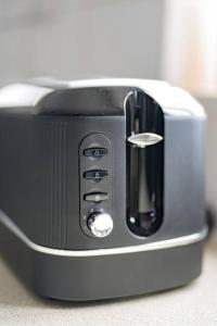 a toaster is sitting on a counter at Apartment in Warwick - Business - Contractors - Families - Reduced Rates in Warwick